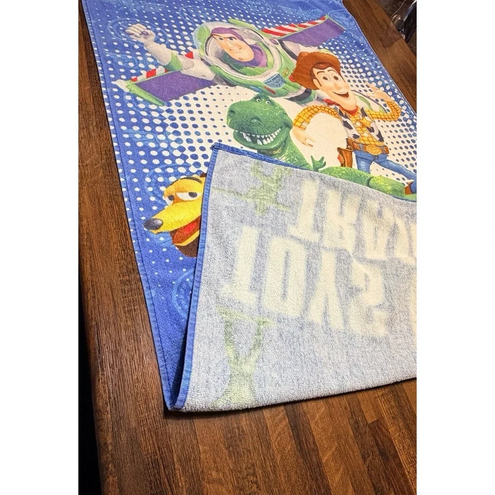 Vintage Toy Story beach towel.  Toys in training with Buzz & Woody. 52X26 inches